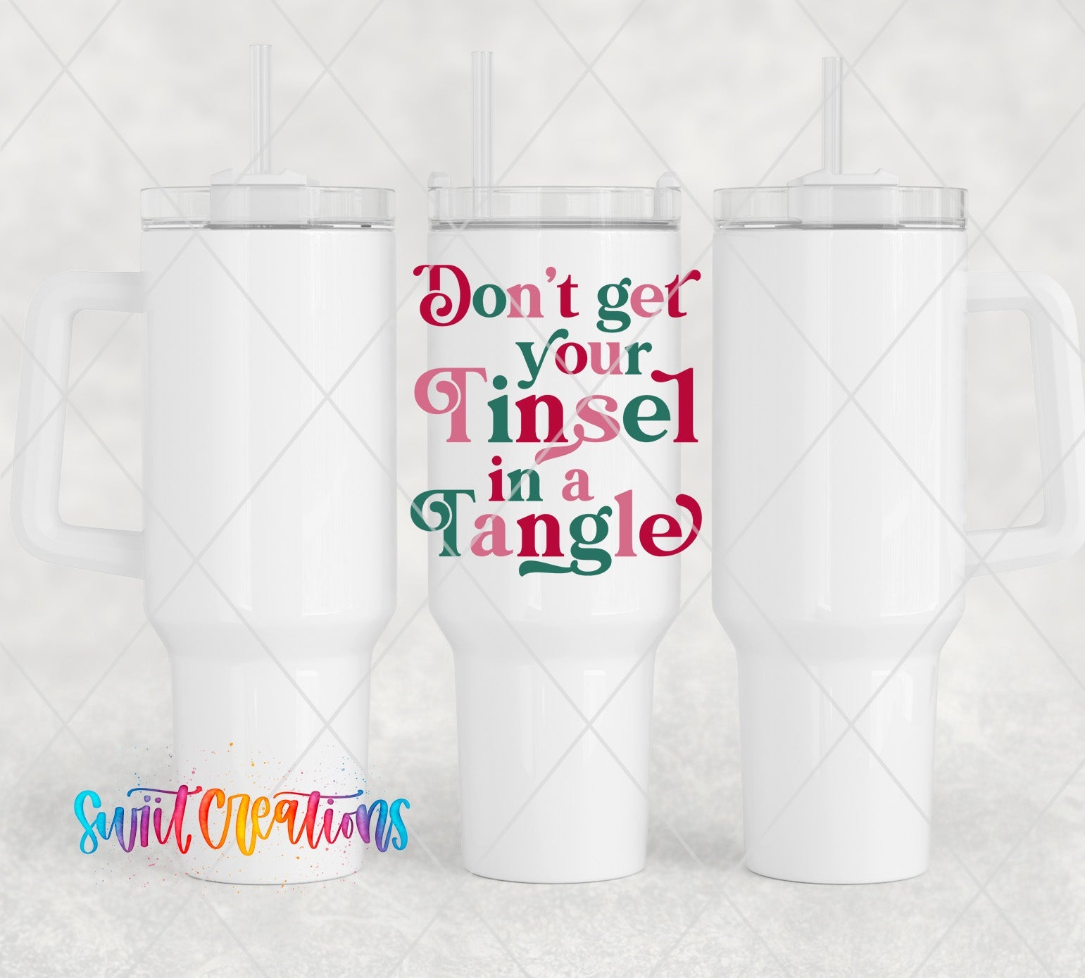 two white tumblers with the words don't get your tinsel in a