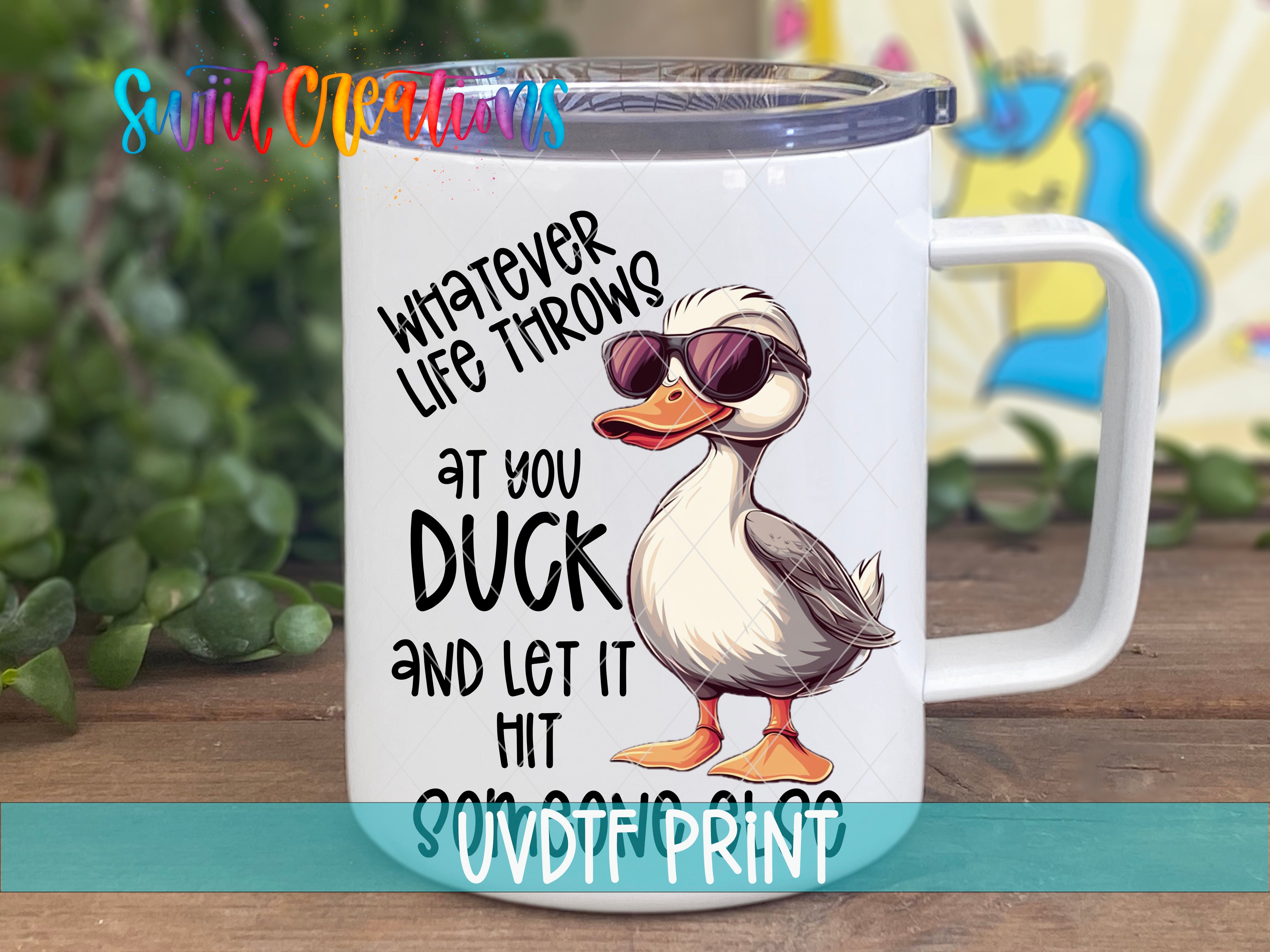 a white coffee mug with a duck wearing sunglasses