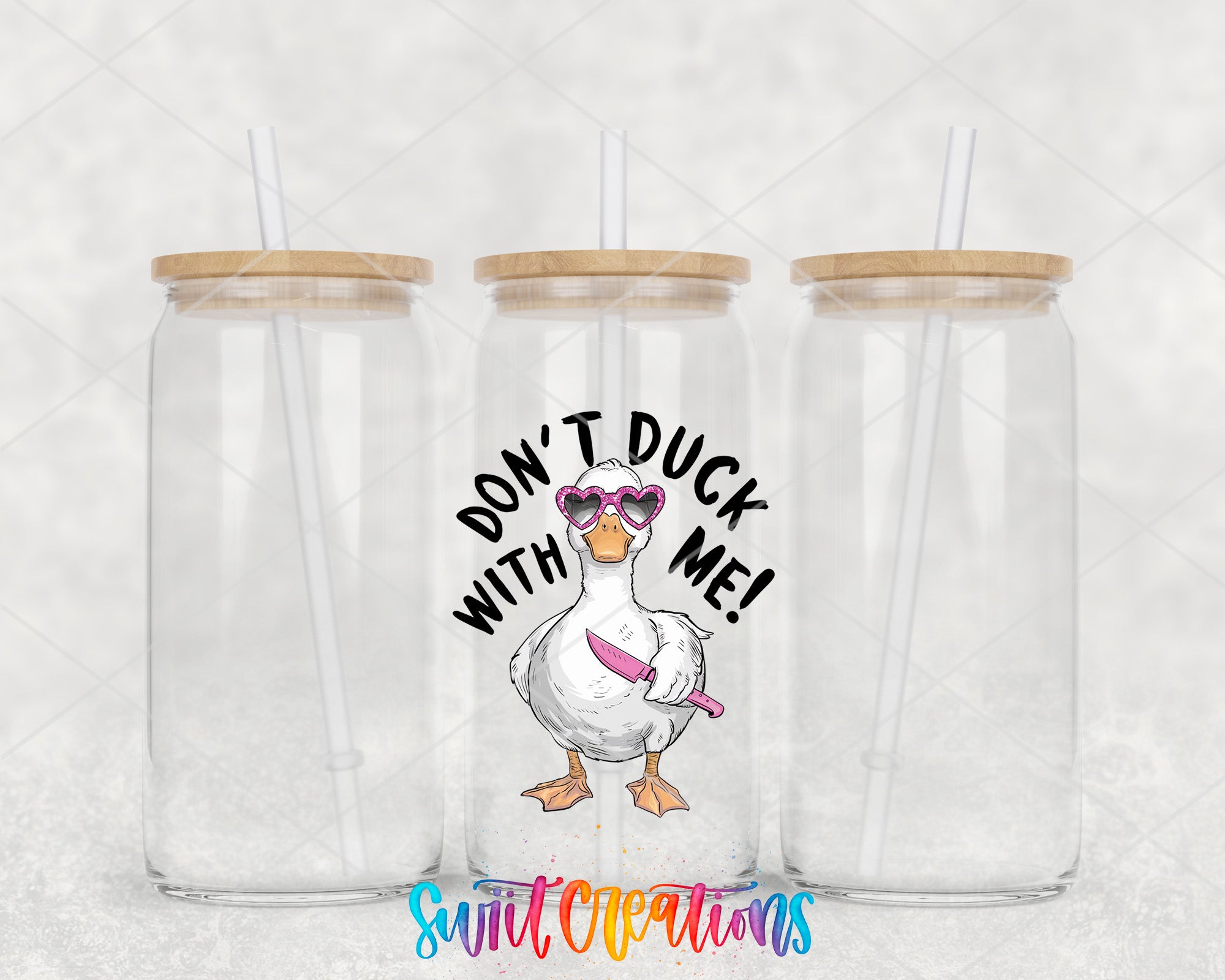a couple of clear cups with a duck on them