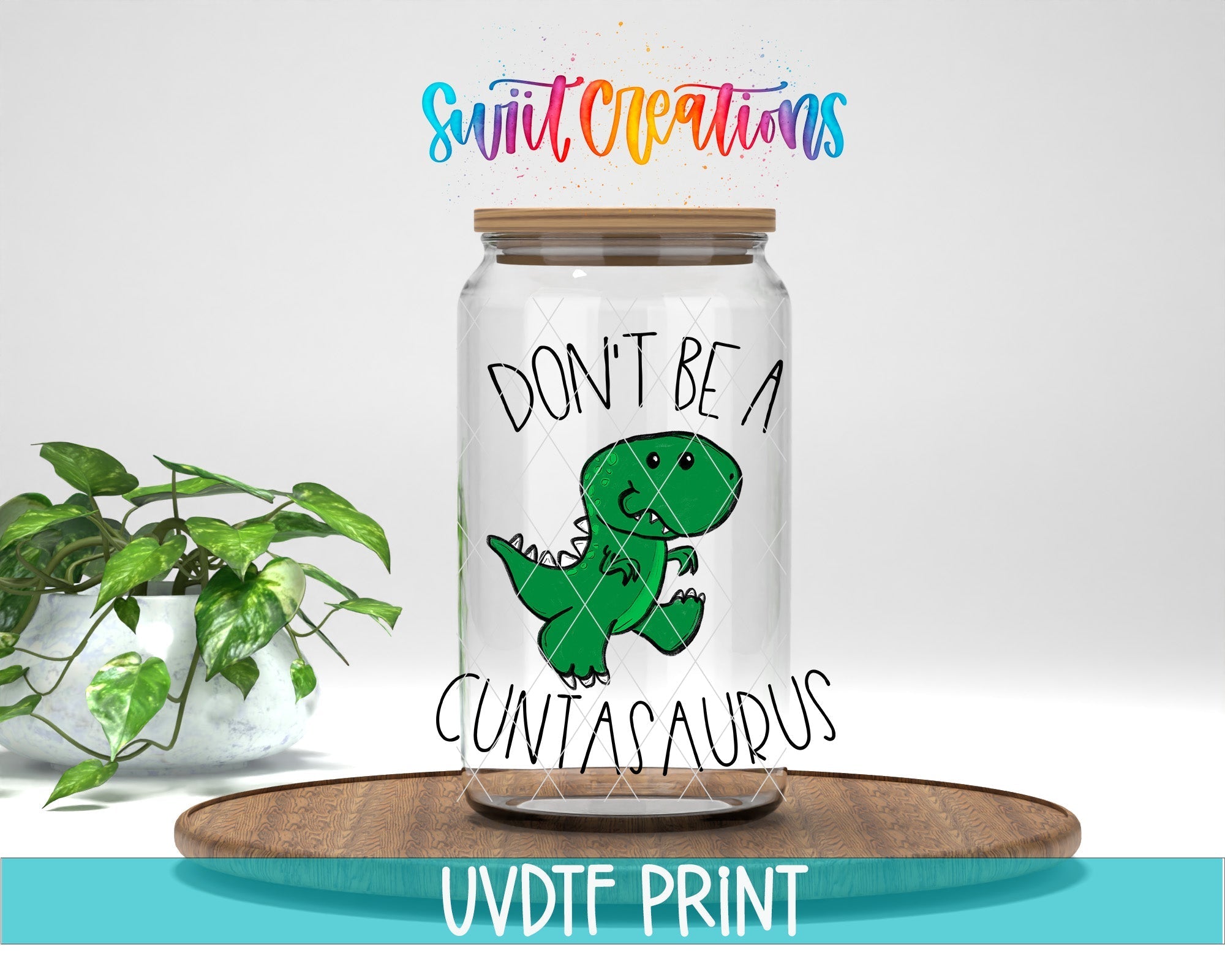 a glass jar with a green dinosaur on it