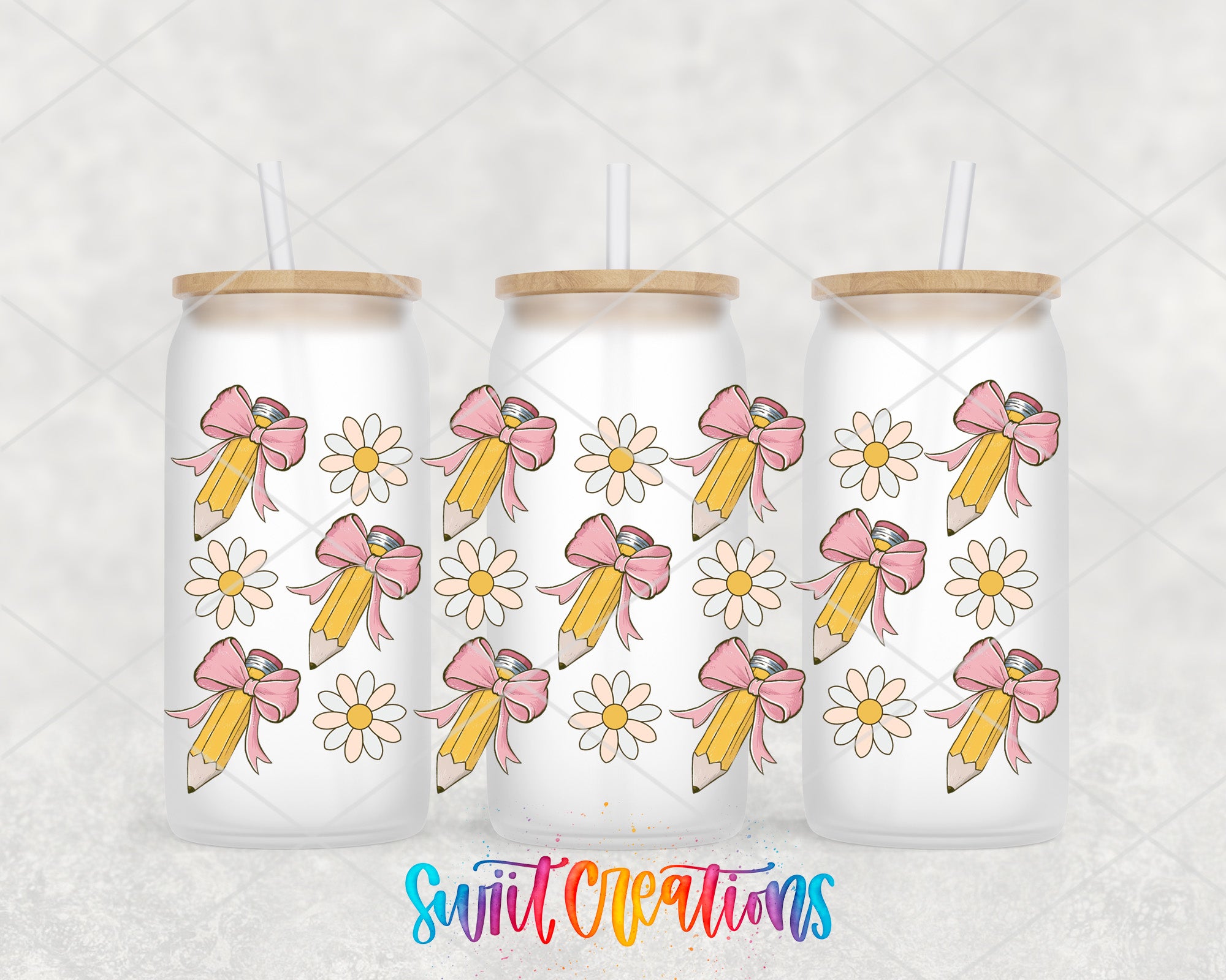 three glass tumblers with a floral pattern and pencil designs on them.