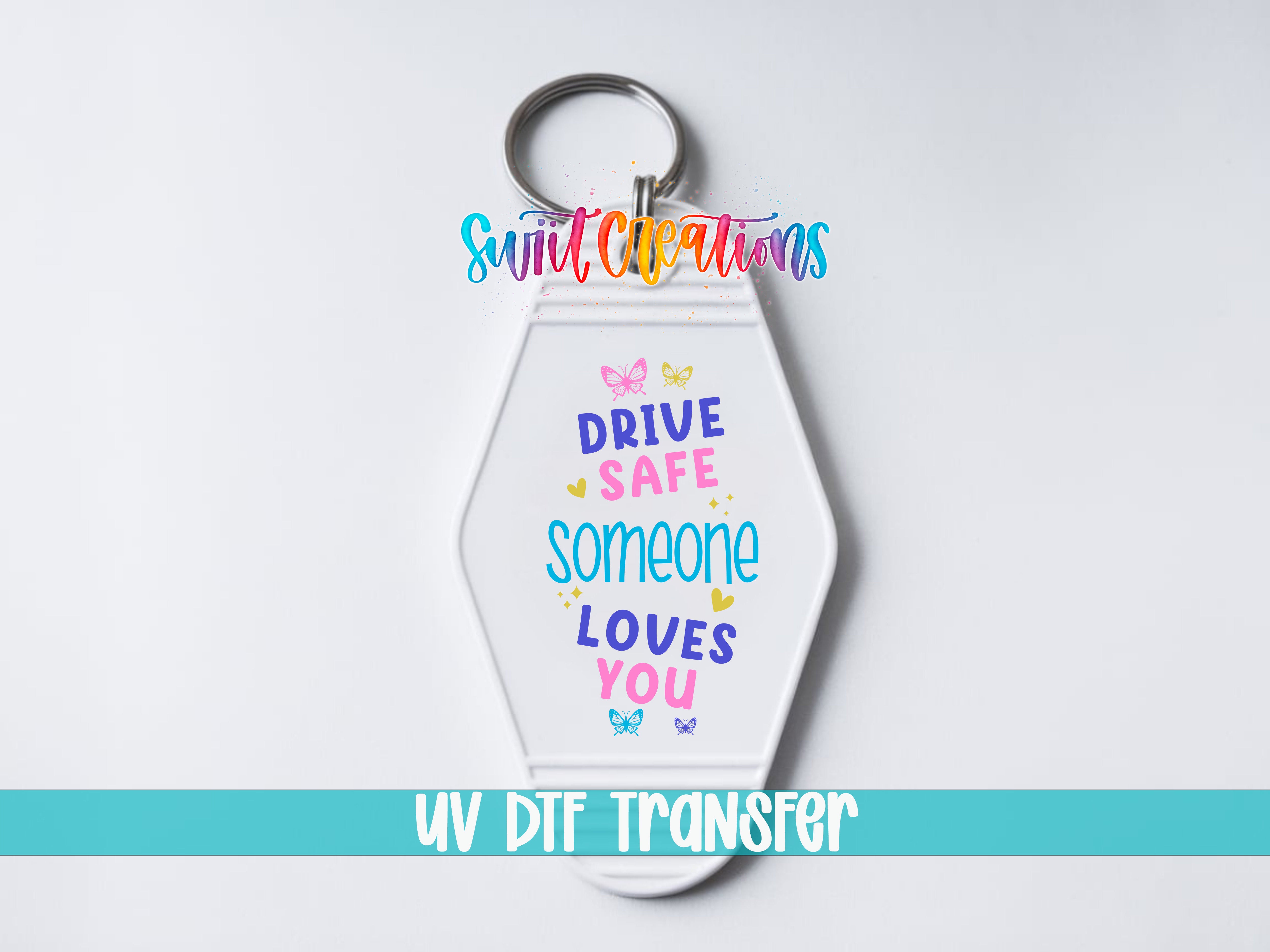 A keychain with a message that says "DRIVE SAFE SOMEONE LOVES YOU" in colorful text.