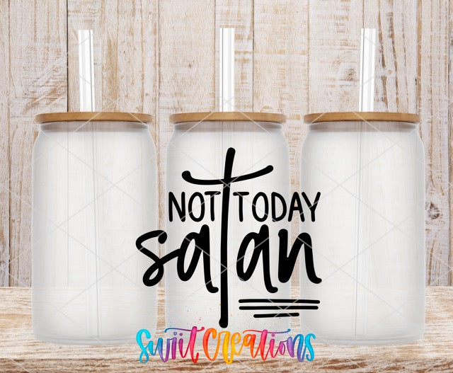 a pair of salt shakers with the words not today satan on them