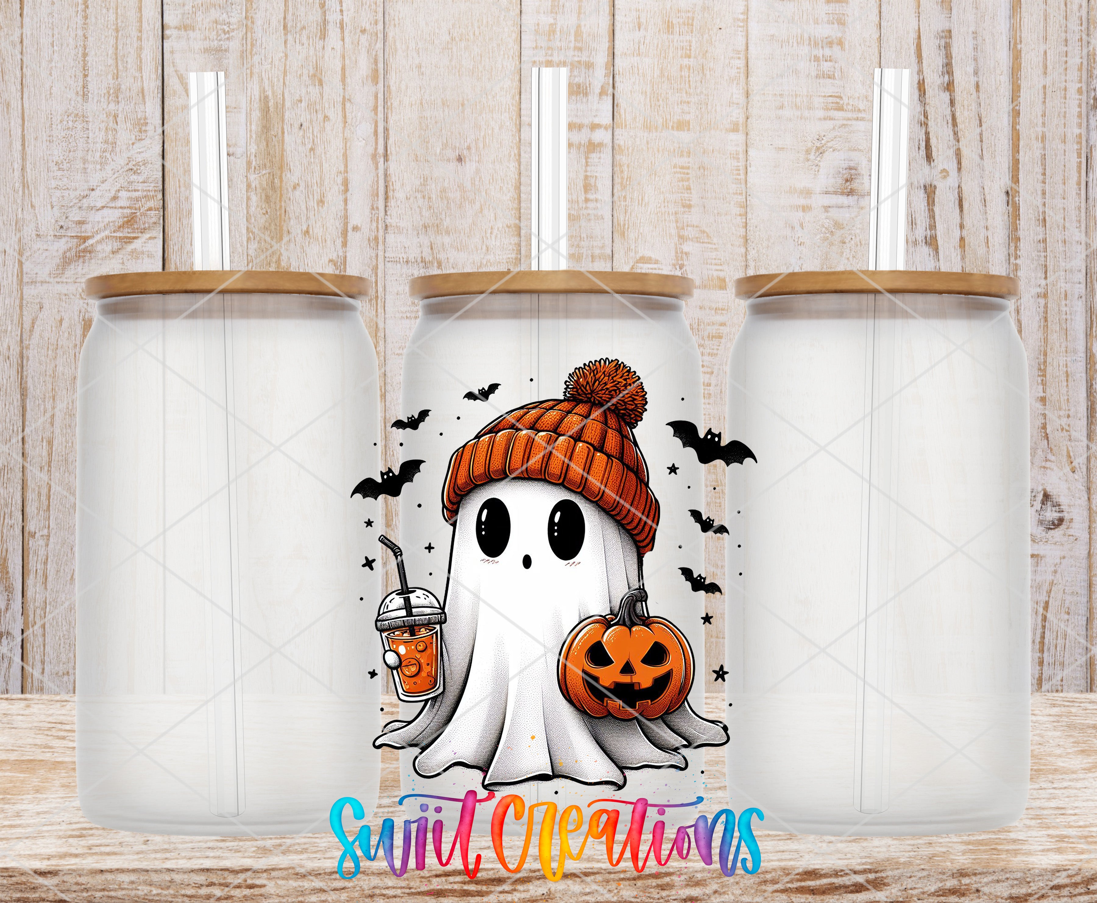 A Halloween-themed tumbler with a ghost wearing a hat and holding a pumpkin, surrounded by bats and a pumpkin.