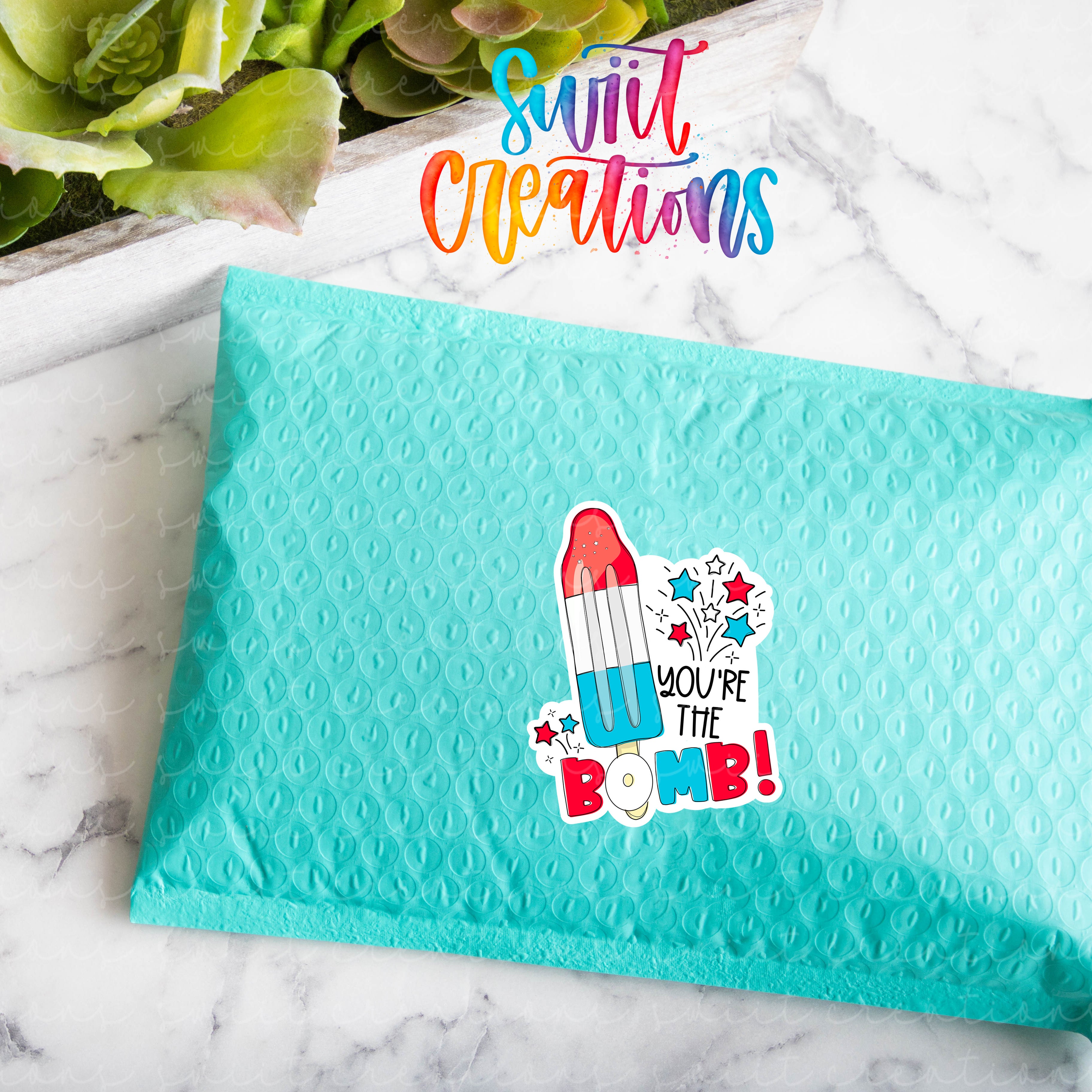 a blue envelope with a sticker on it