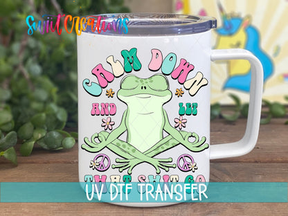 Calm Down and Let That Sh*t Go UV DTF transfer on a white stainless steel mug with a lid