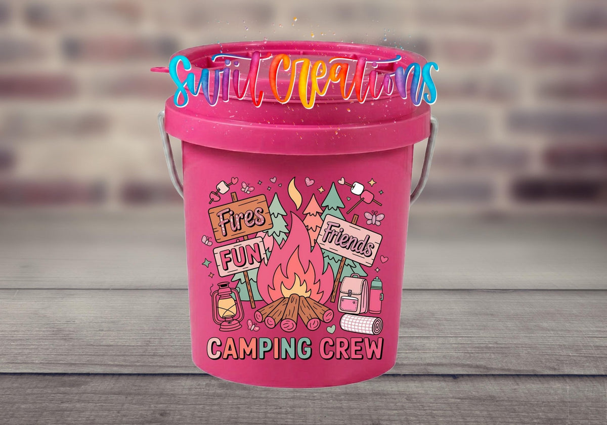 Camping Crew UV DTF transfer on a pink mini bucket by a brick wall