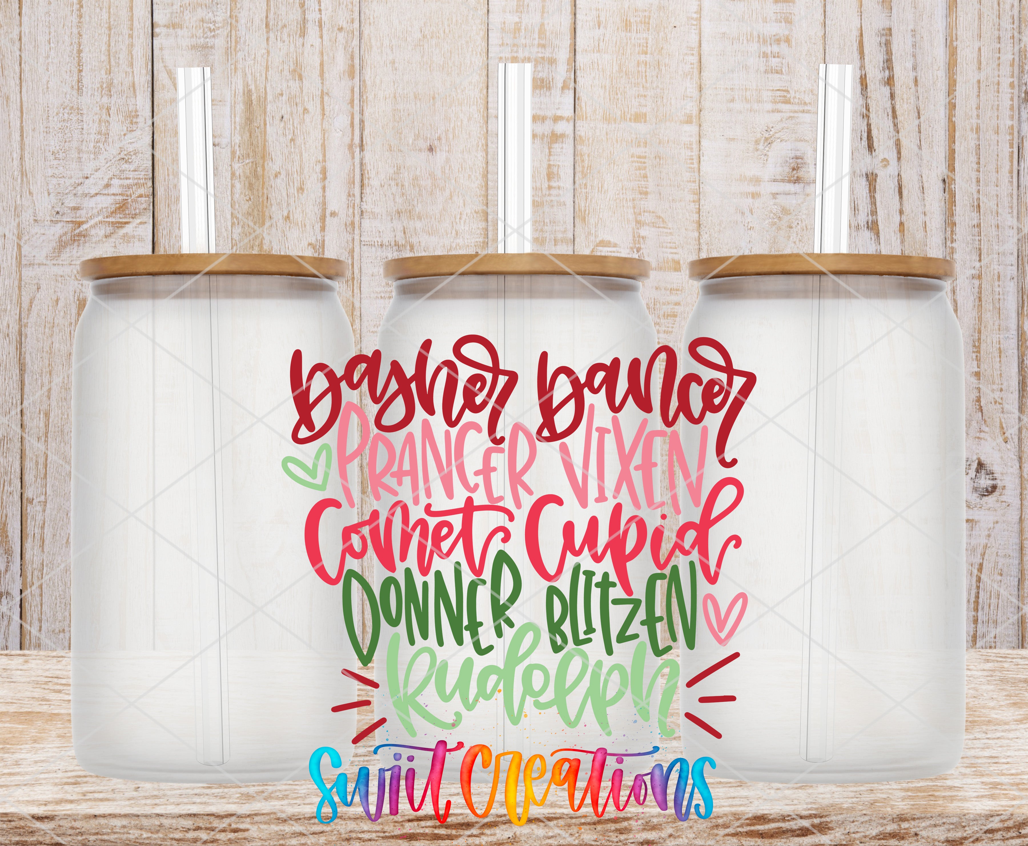 three glass jars with lids, arranged in a row against a wooden background. The jars have straws attached to their lids. The image also contains colorful text that reads "Dasher Dancer Pranger Vixen Comet Cupid Donner Blized Rudelph" and "Swift Creations" at the bottom.