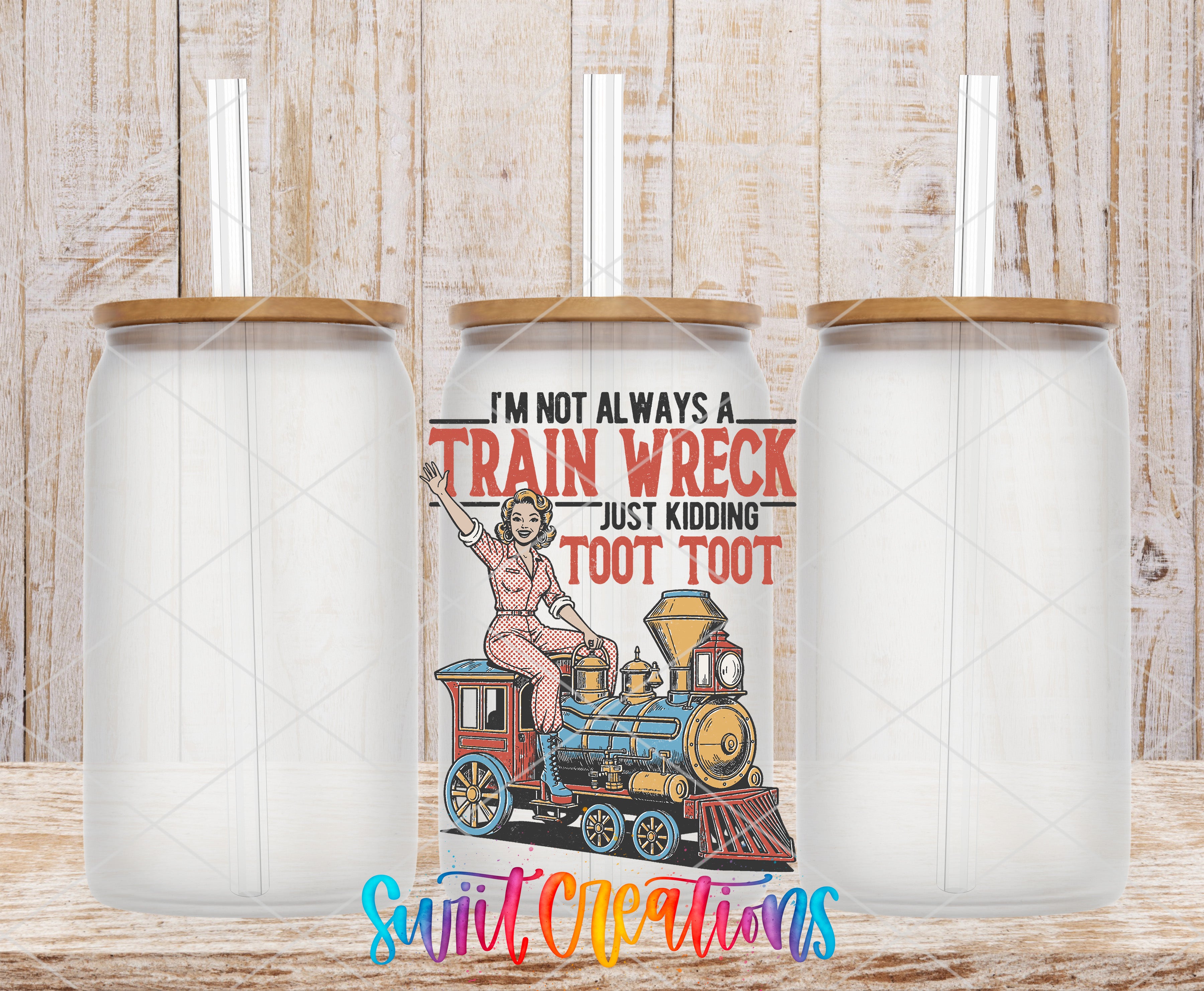 a train-themed design with a woman riding a train and the text "I'M NOT ALWAYS A TRAIN WRECK JUST KIDDING Toot Toot" displayed on a canister with a straw.