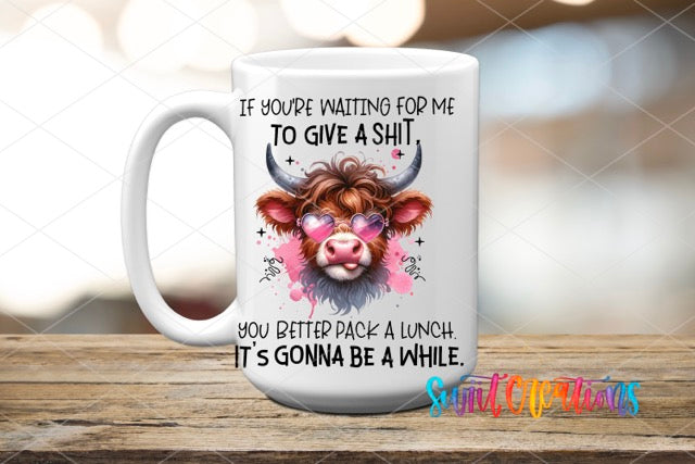 a coffee mug with a picture of a cow on it