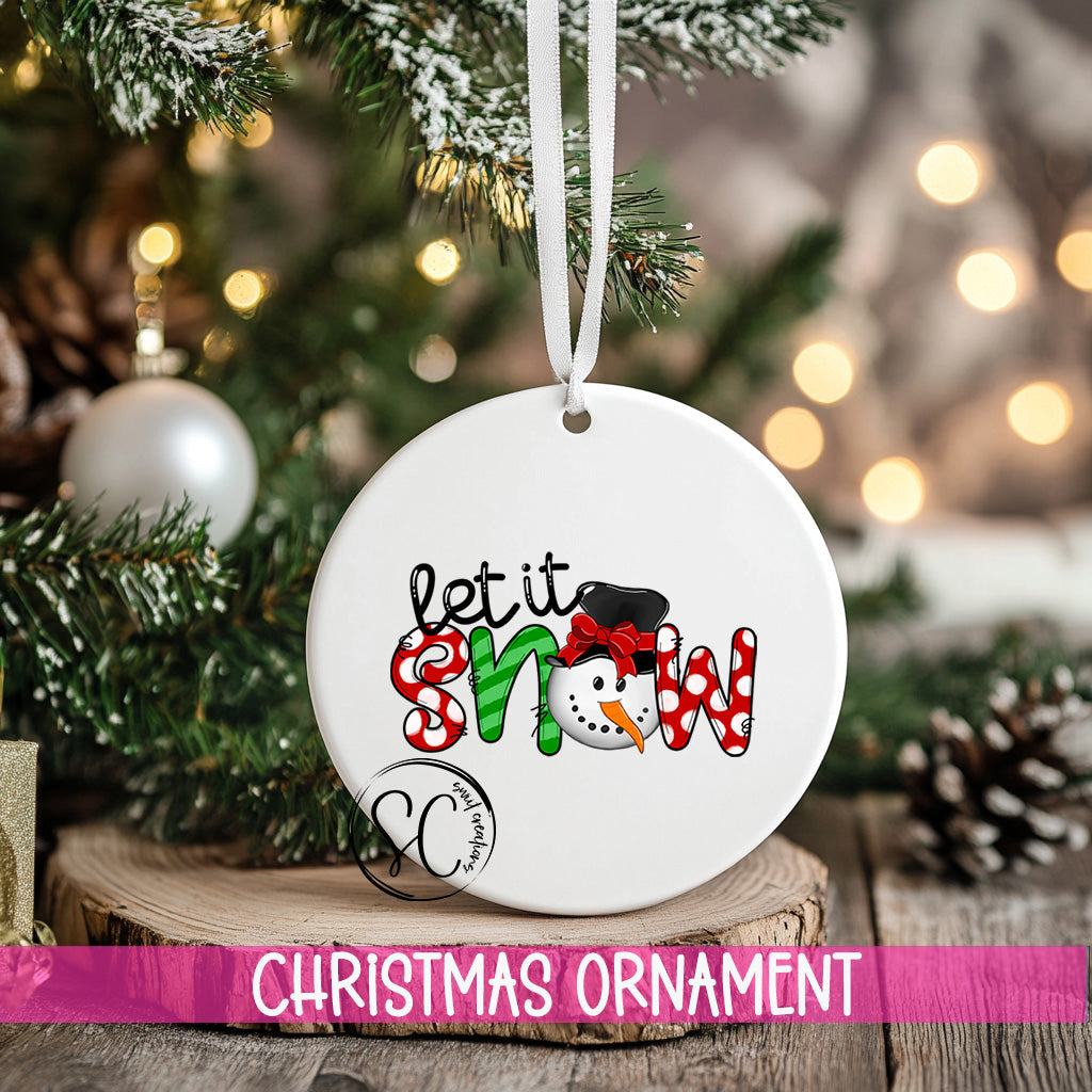 a christmas ornament hanging from a christmas tree