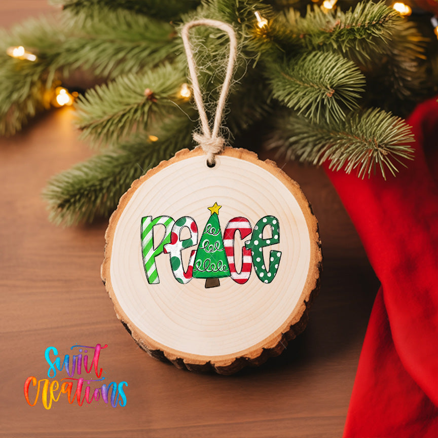 A wooden ornament with the word "Peace" written on it, hanging on a Christmas tree.