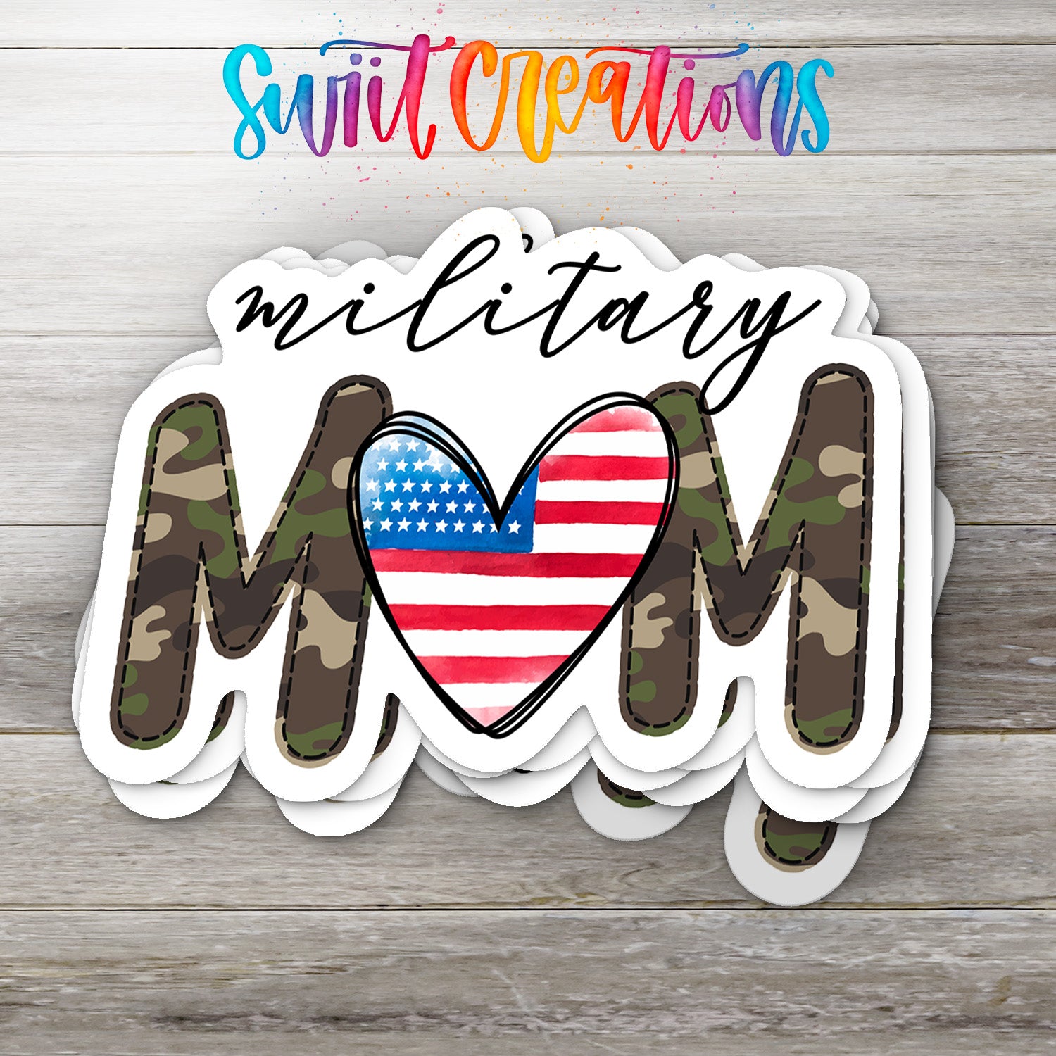 A sticker with the word "MOM" in camouflage letters, with an American flag inside the letters, and the text "Swift Creations" written above it.