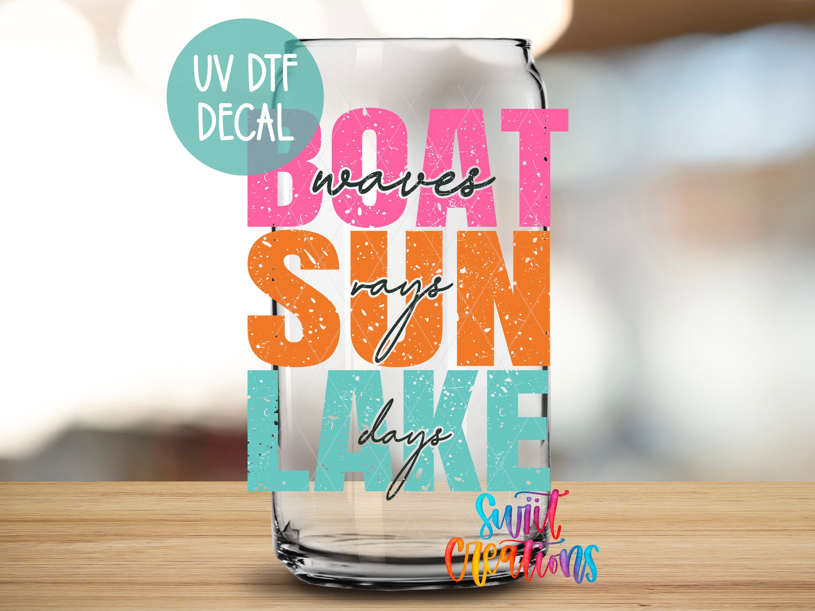 a glass with a quote on it sitting on a table