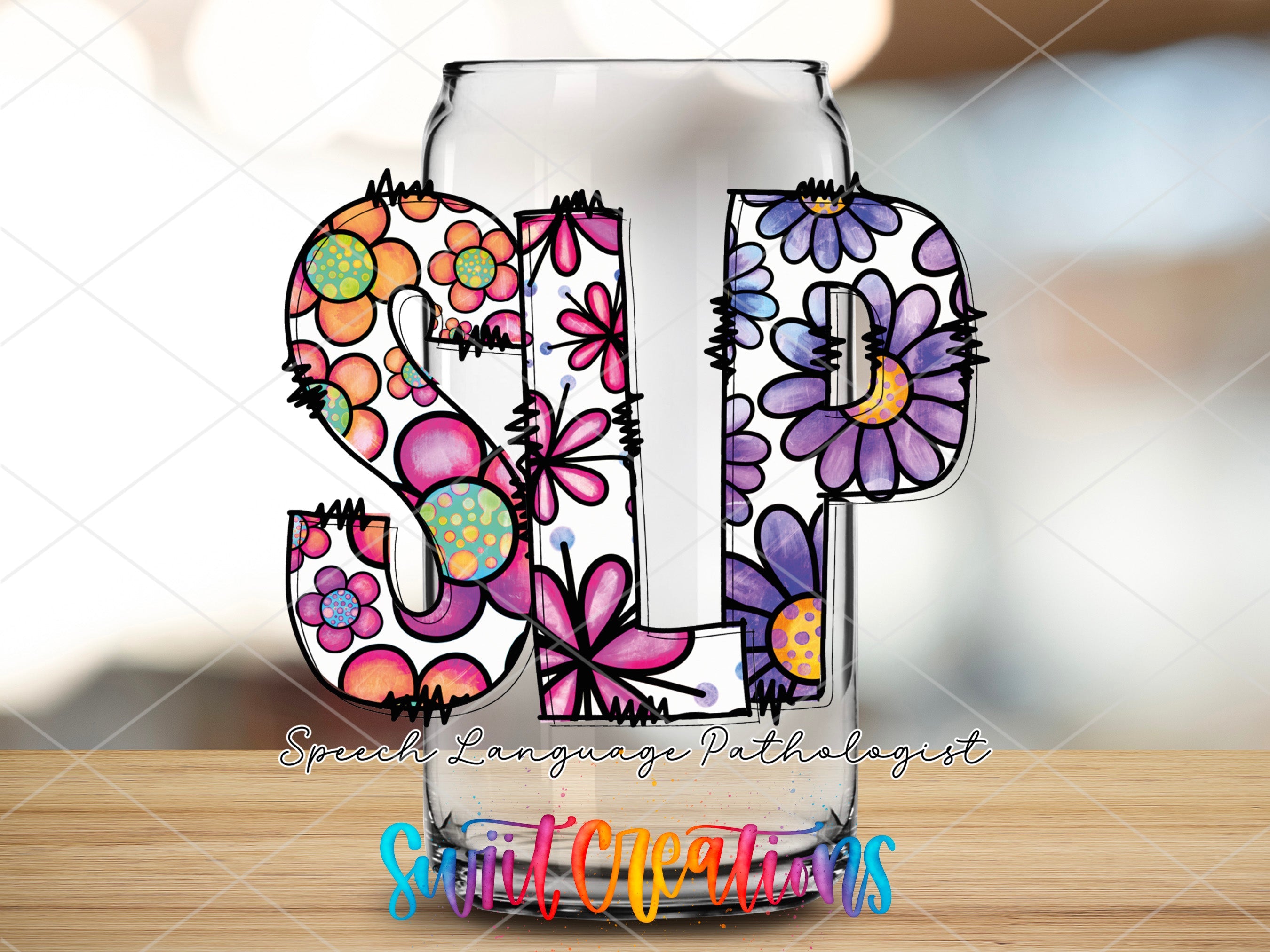 a glass with the number thirteen decorated with flowers