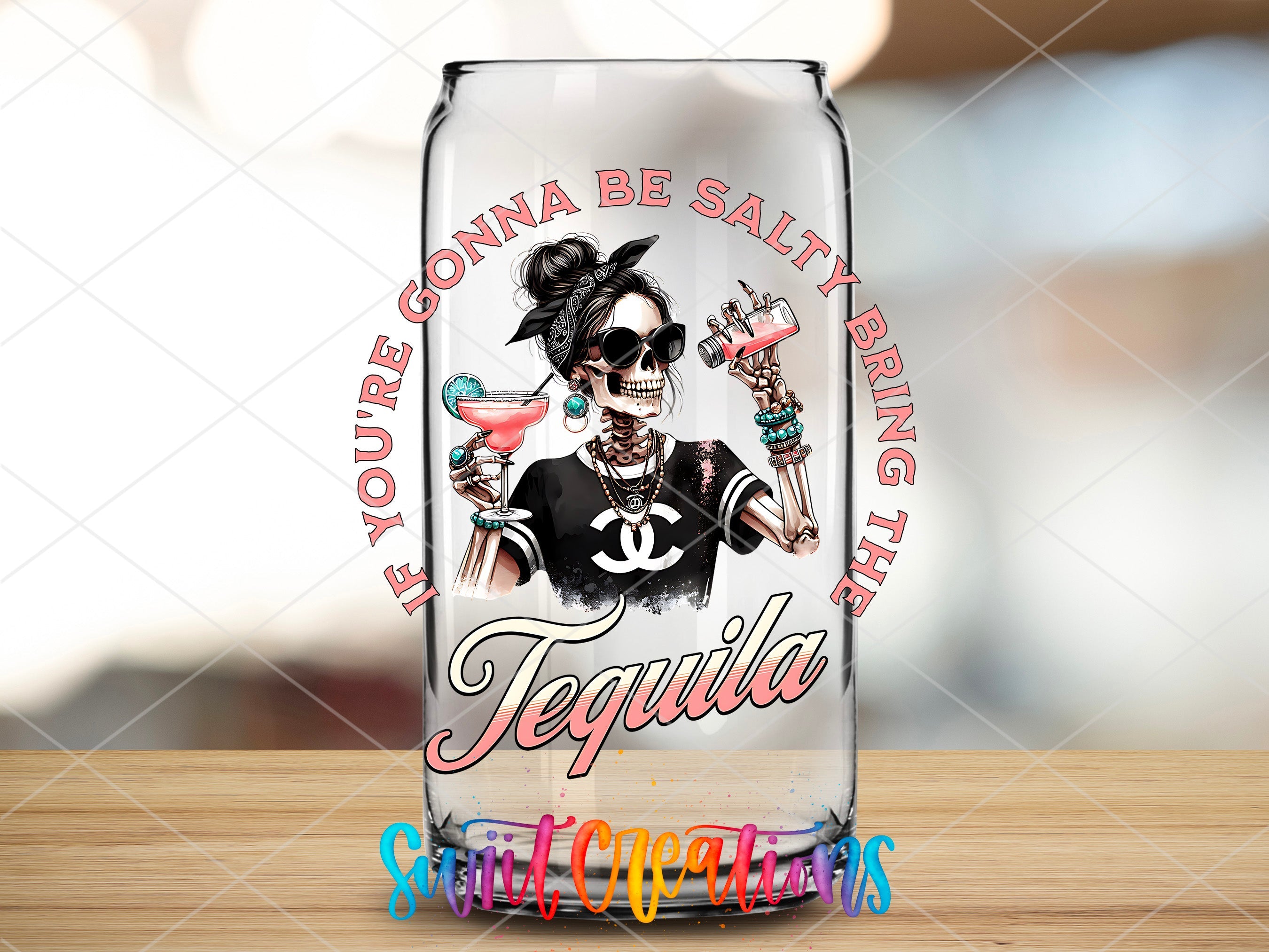 a glass with a picture of a woman on it
