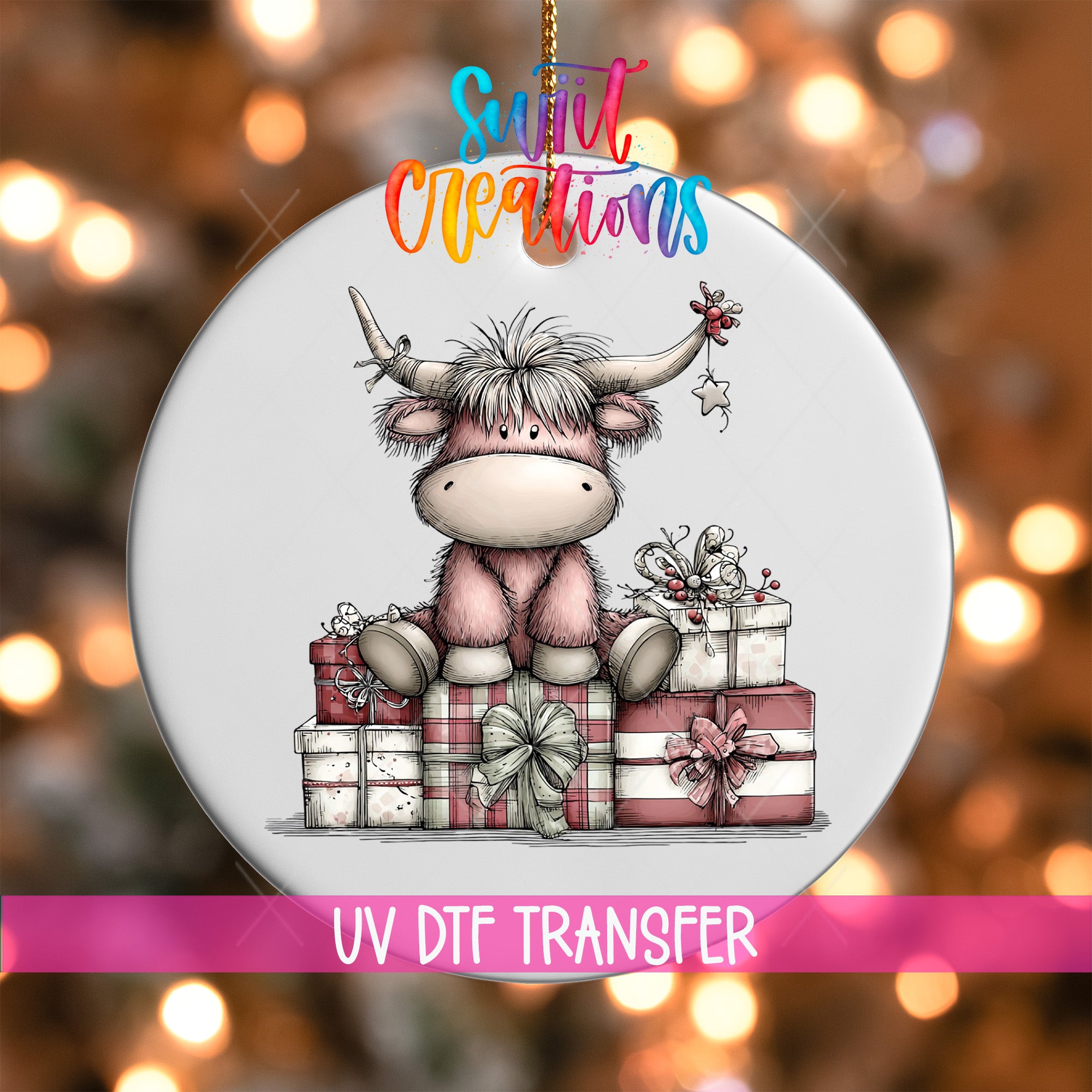 A decorative ornament featuring a cartoon cow sitting on a pile of wrapped gifts, with a Christmas tree in the background.