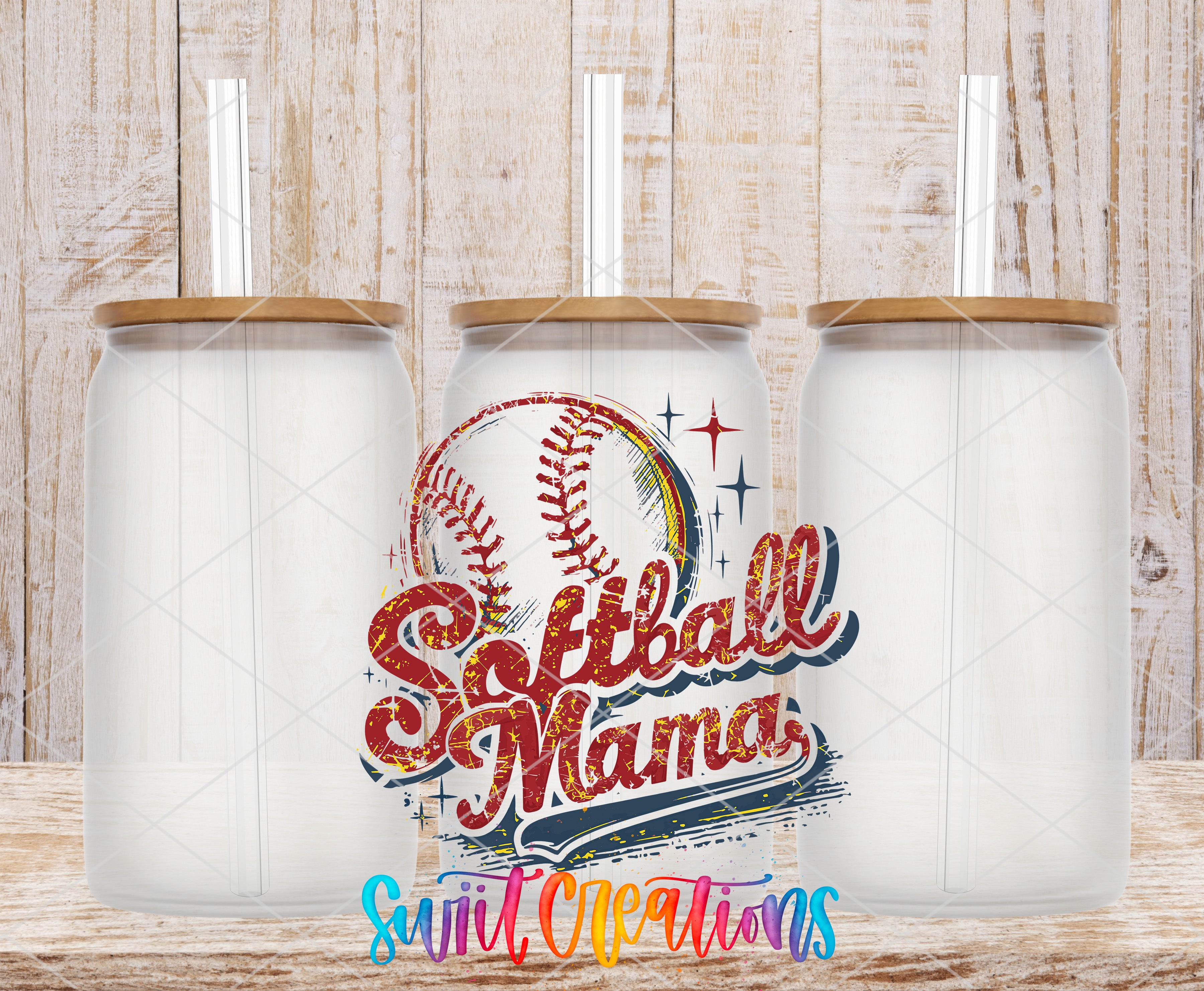 three clear glass jars with lids, arranged in a row against a wooden background. The jars have a baseball design on them, and there is text in the center of the image that reads "Softball Mama".