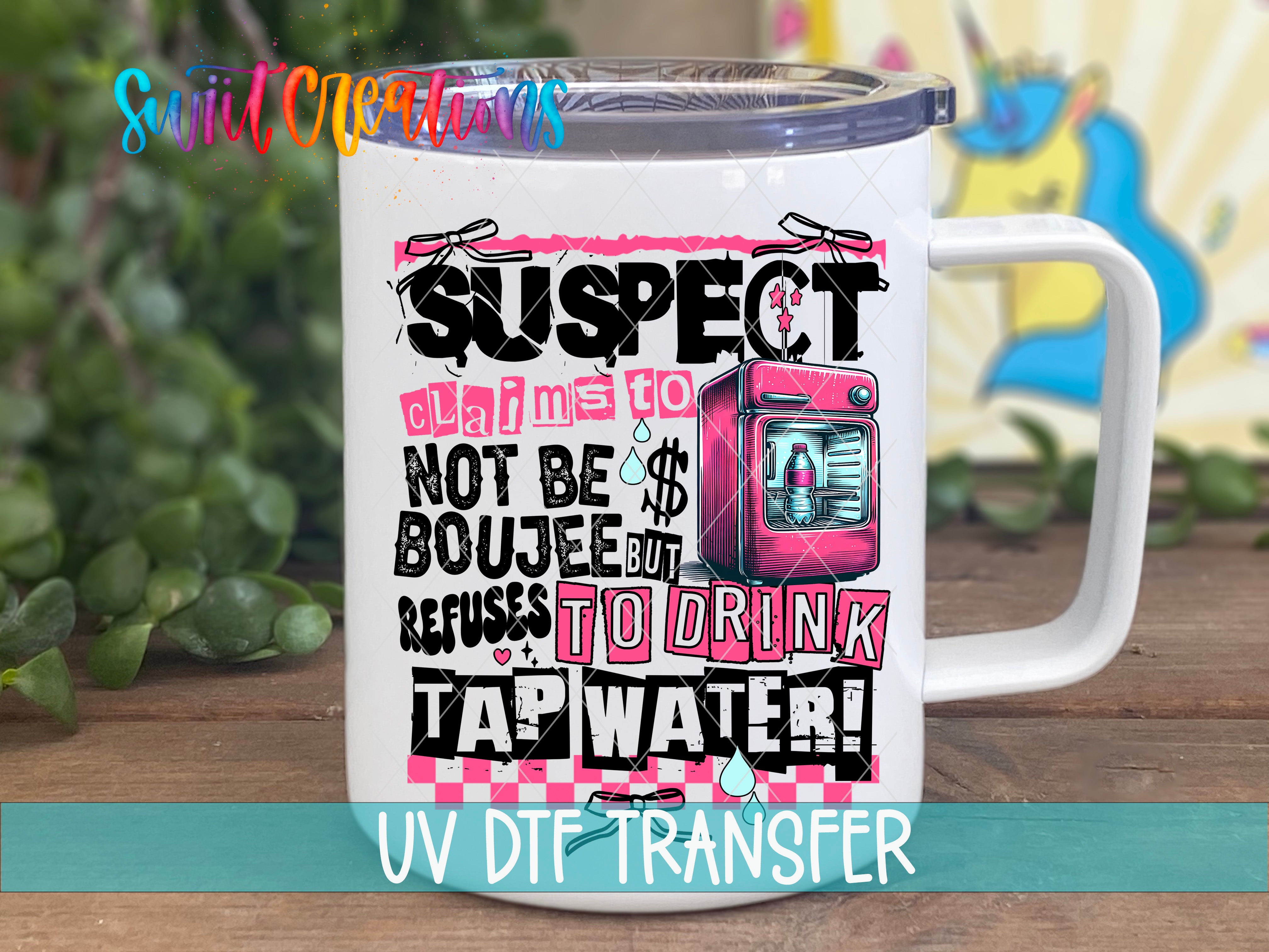 A white mug with a colorful design featuring text and an illustration of a pink object, likely a water bottle or cup.