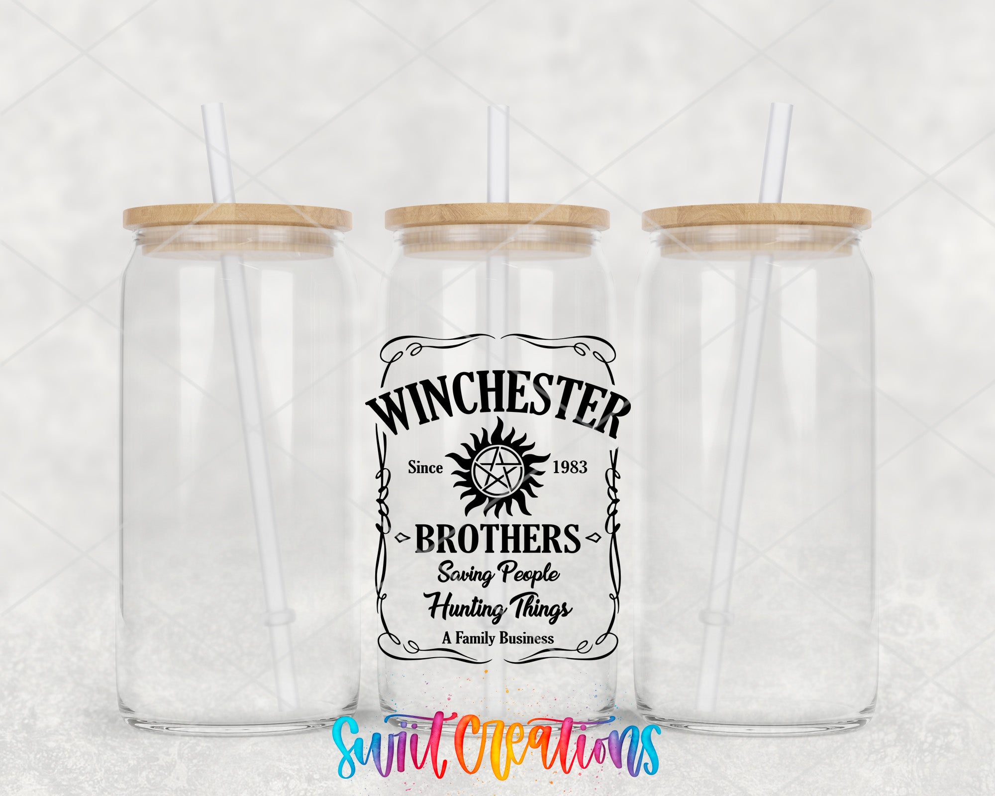 a couple of glass jars sitting on top of a table