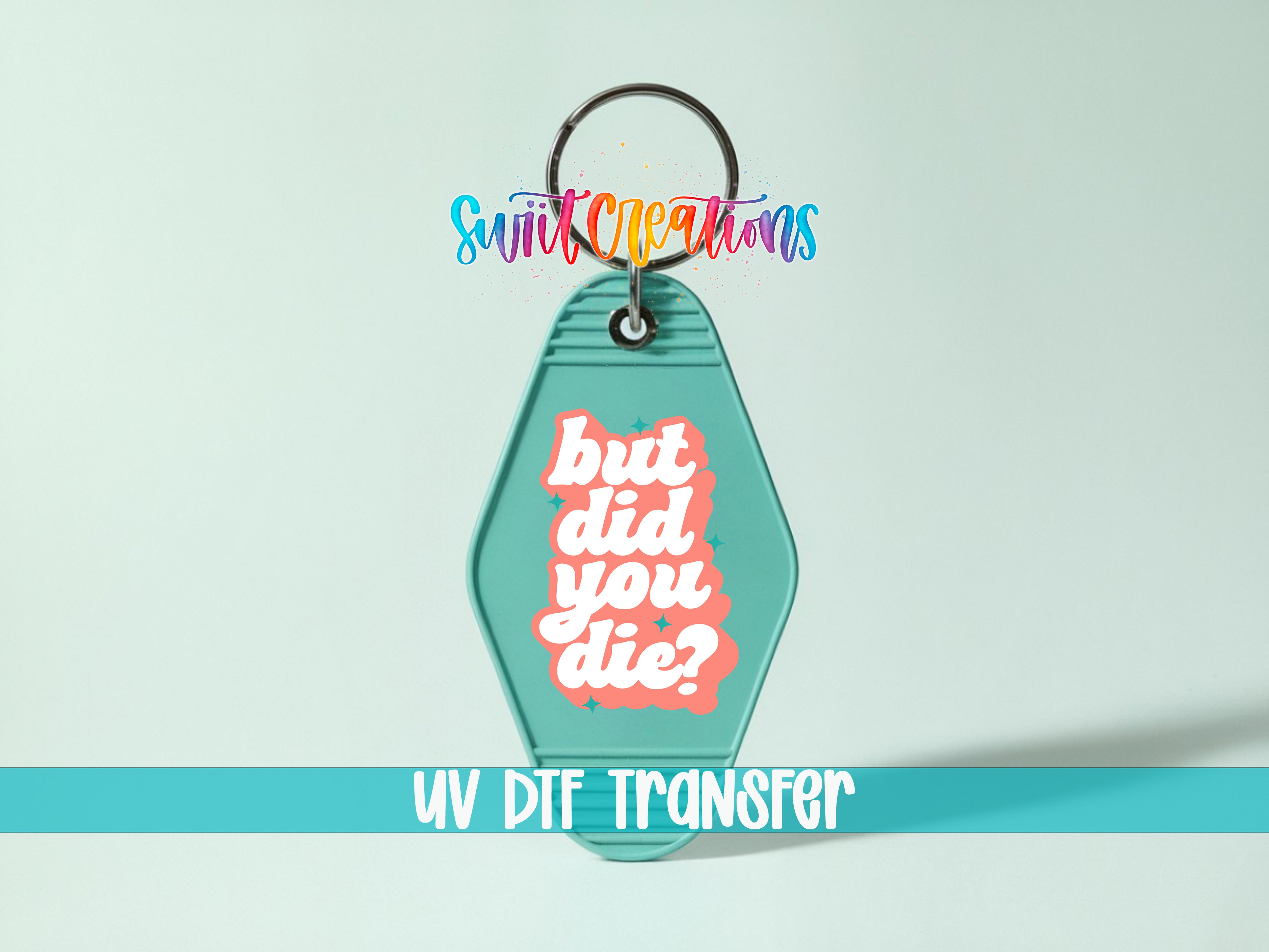 A keychain with a colorful design and text on it, along with the text "UV DIF TRANSFER" below it.