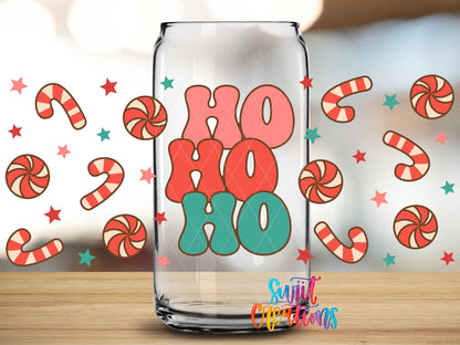 Close-up of the Ho Ho Ho UV DTF full wrap on a clear glass can
