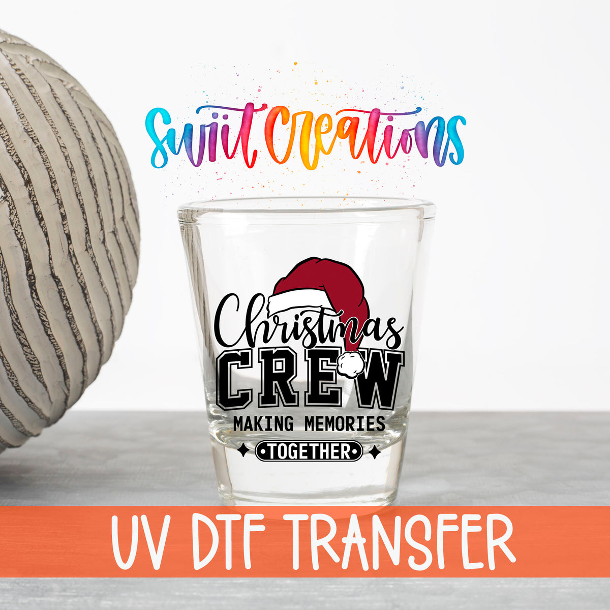 Christmas Crew Making Memories Together UV DTF transfer on a clear shot glass with the Swiit Creations logo and UV DTF Transfer banner