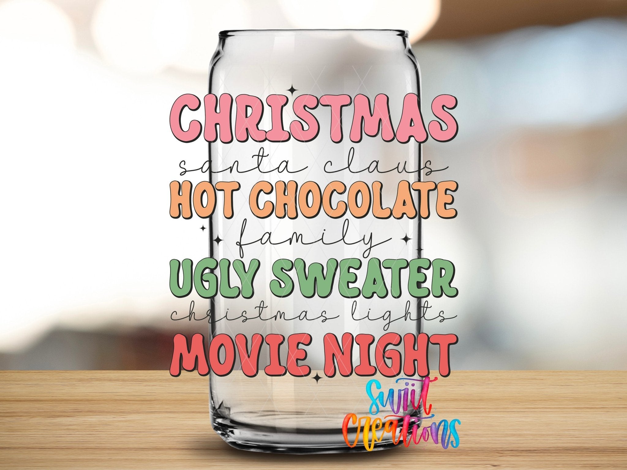 Swiit Creations UV DTF Christmas Hot Chocolate Ugly Sweater Movie transfer applied to a clear glass can