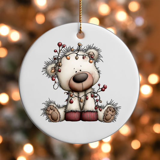 Christmas Lights White Bear ornament UV DTF transfer on a round white ornament with a bokeh light background