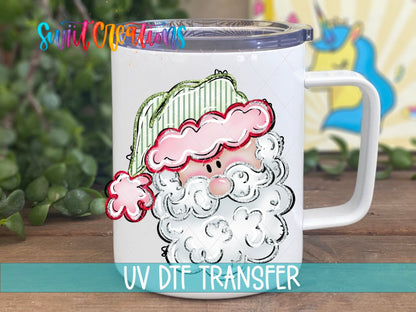 Pink Santa Face UV DTF transfer on a white stainless steel mug with a lid