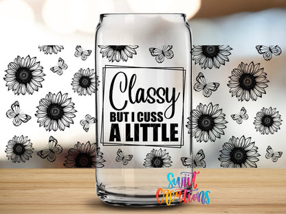 Close-up of the Classy But I Cuss a Little UV DTF full wrap on a clear glass can
