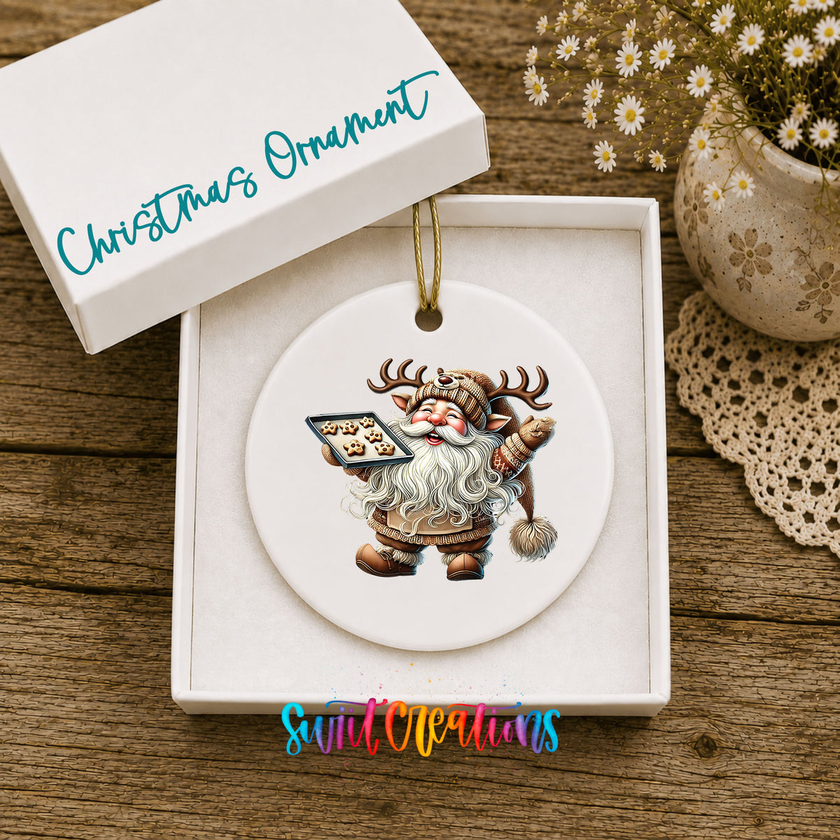 Santa checking his Christmas list ceramic Christmas ornament displayed in the included gift box