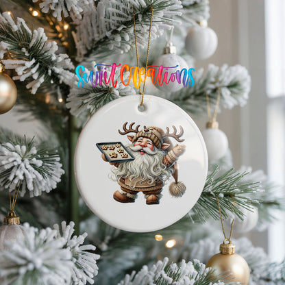 Santa checking his Christmas list ceramic Christmas ornament hanging on a frosted Christmas tree