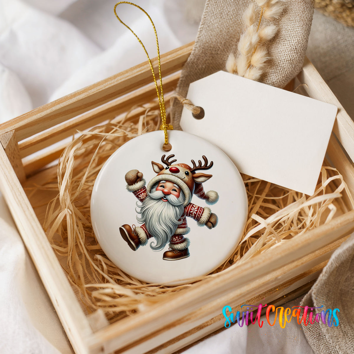 dancing Santa in a reindeer costume ceramic Christmas ornament displayed in a rustic wooden gift crate
