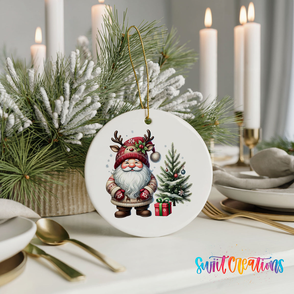 Santa beside a Christmas tree and wrapped gift ceramic Christmas ornament displayed with elegant holiday table decor