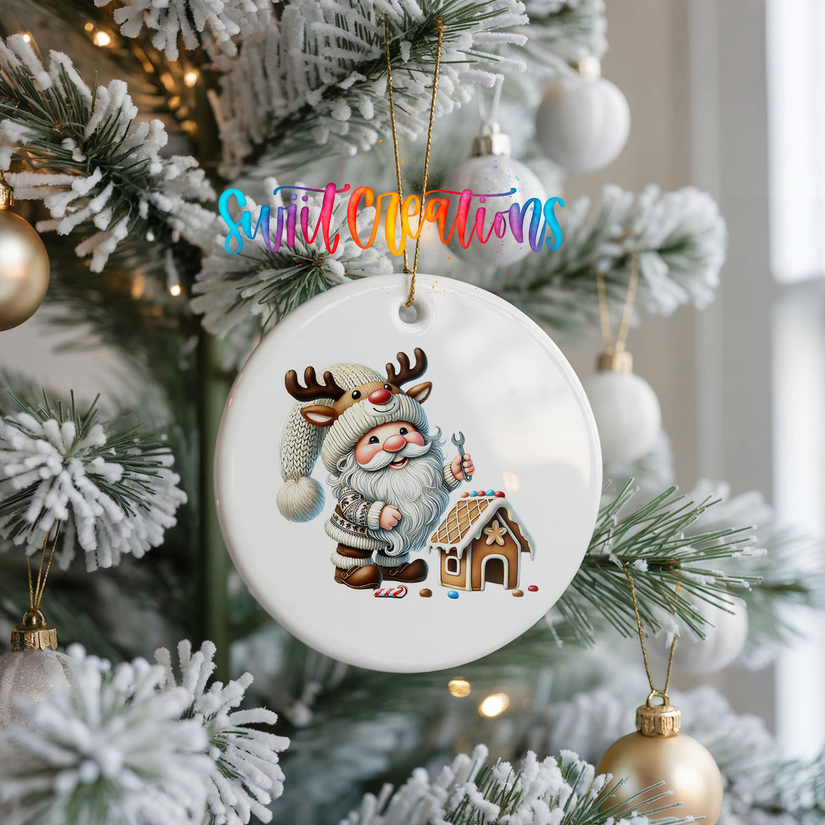 Santa decorating a gingerbread house ceramic Christmas ornament hanging on a frosted Christmas tree