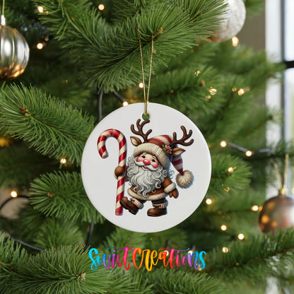 Santa holding an oversized candy cane ceramic Christmas ornament hanging on a green Christmas tree