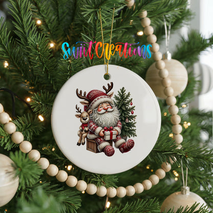 Round ceramic Christmas ornament featuring Santa with a reindeer beside a decorated Christmas tree, hanging on a decorated Christmas tree