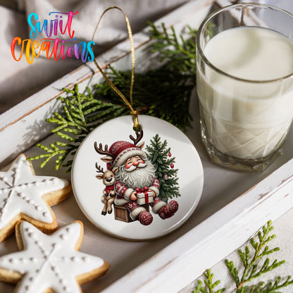 Round ceramic Christmas ornament featuring Santa with a reindeer beside a decorated Christmas tree, styled with cookies and milk