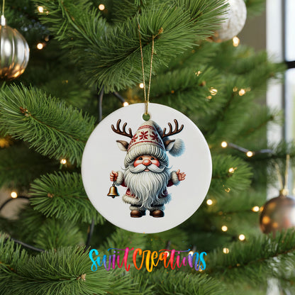 Round ceramic Christmas ornament featuring Santa ringing a Christmas handbell, hanging on a green Christmas tree