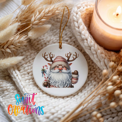 Round ceramic Christmas ornament featuring Santa holding a candy cane and mug of cocoa, styled beside a candle and cozy knit blanket
