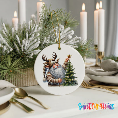 Round ceramic Christmas ornament featuring Santa placing a star on a Christmas tree, styled with elegant holiday table decor