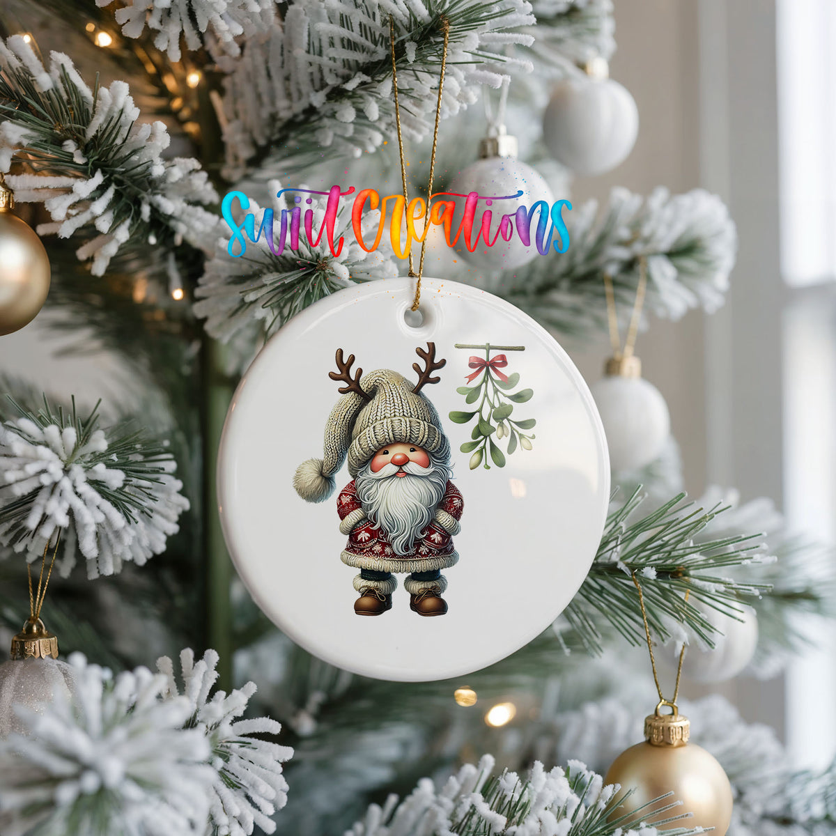 Round ceramic Christmas ornament featuring Santa standing beneath Christmas mistletoe, hanging on a frosted Christmas tree