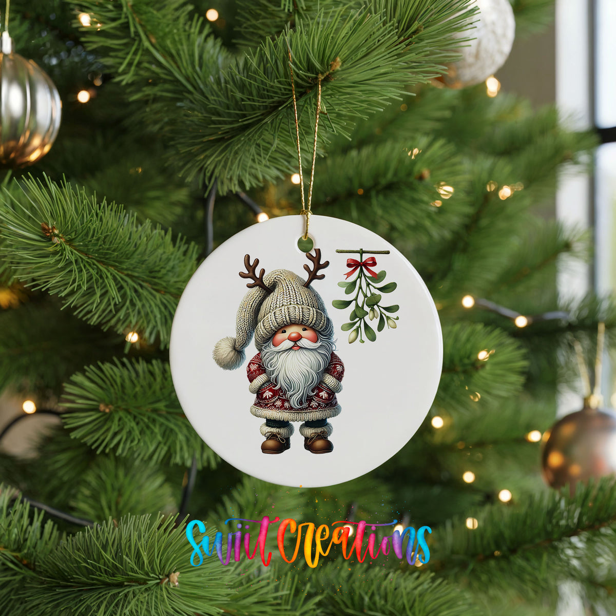 Round ceramic Christmas ornament featuring Santa standing beneath Christmas mistletoe, hanging on a green Christmas tree