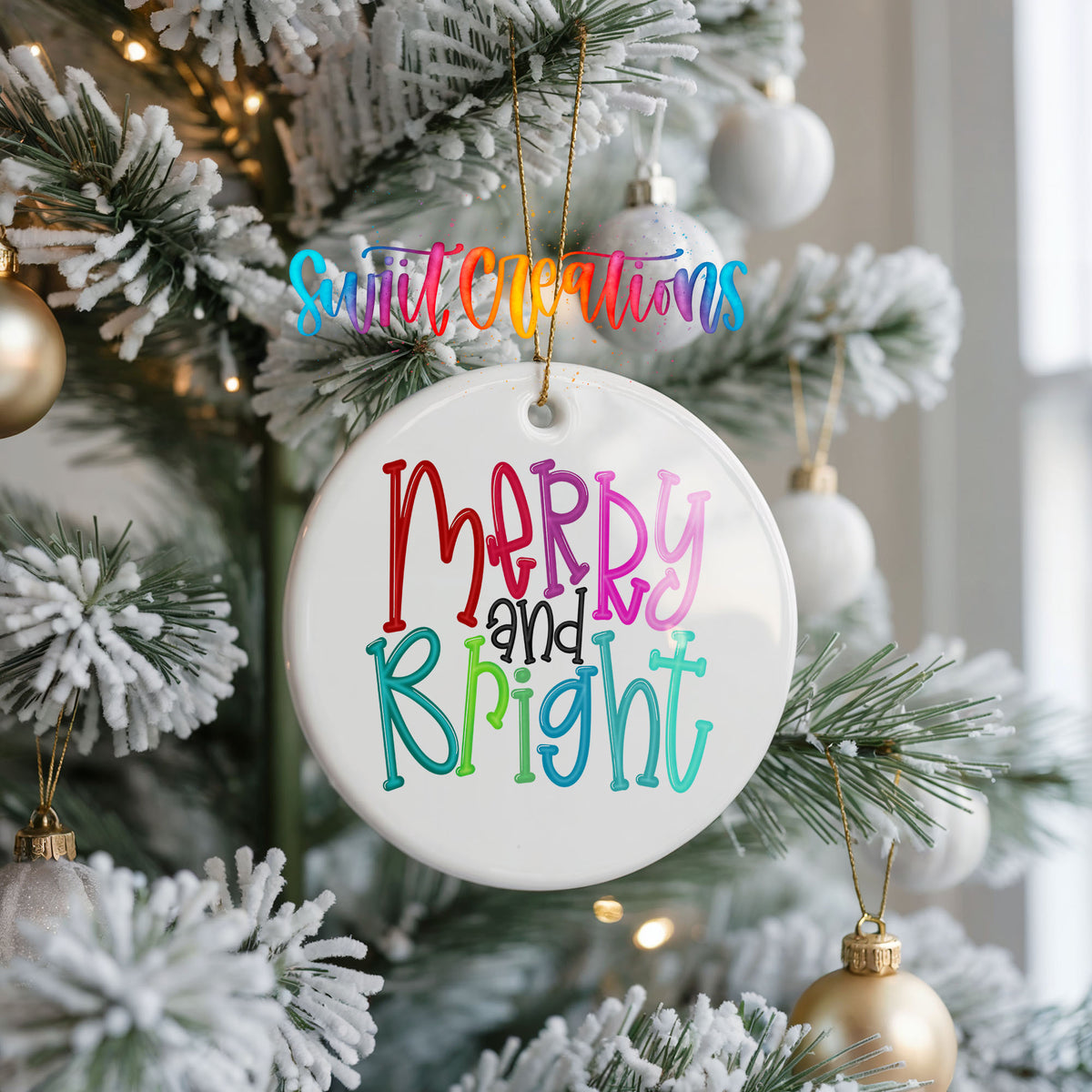 Round ceramic Christmas ornament featuring colorful hand-lettered Merry and Bright holiday typography, hanging on a frosted Christmas tree