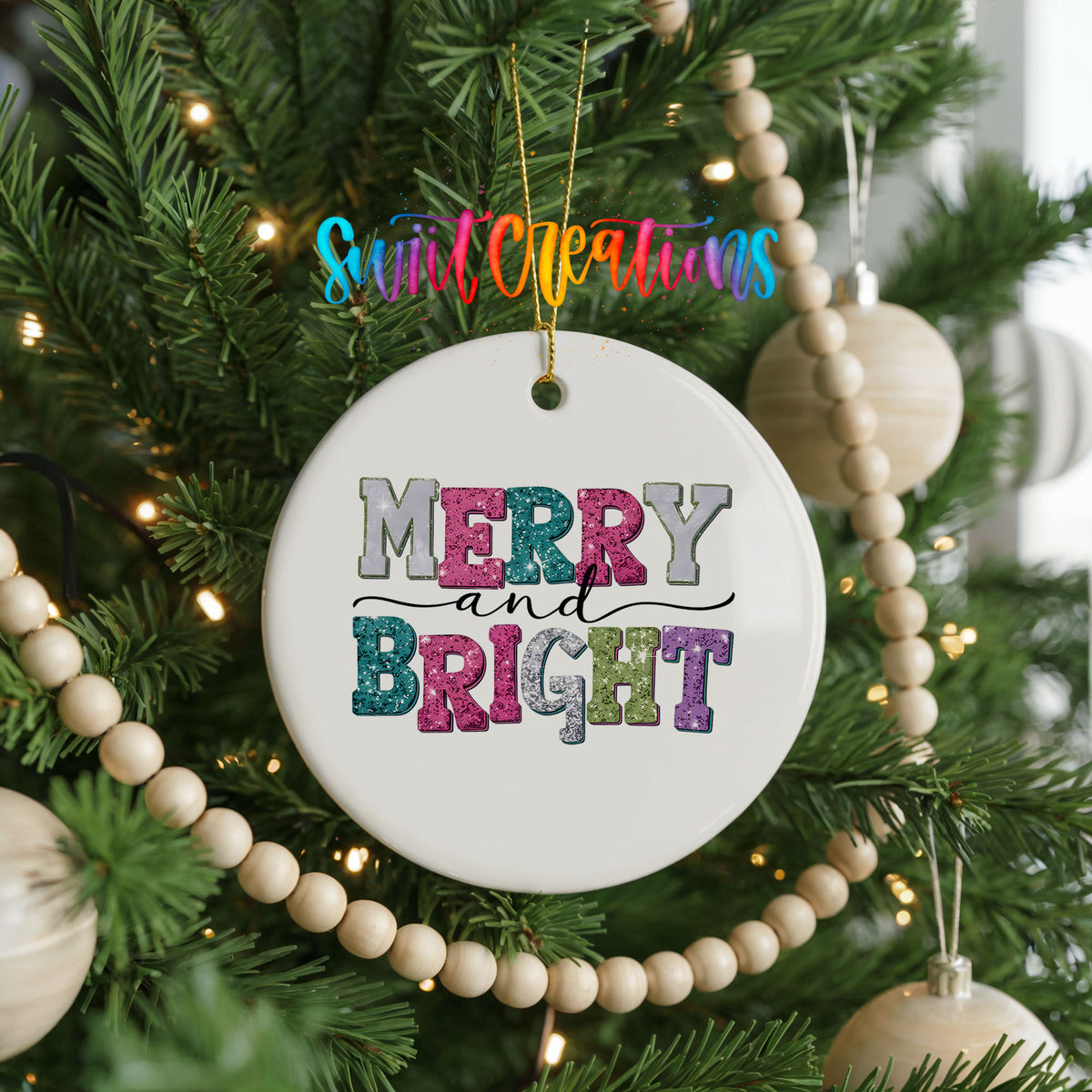 Round ceramic Christmas ornament featuring distressed patchwork Merry and Bright holiday typography, hanging on a decorated Christmas tree