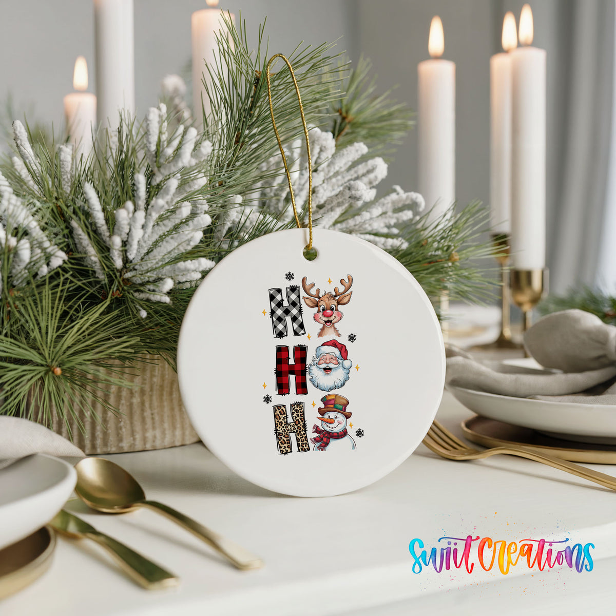 Round ceramic Christmas ornament featuring stacked Ho Ho Ho lettering with cheerful holiday characters, styled with elegant holiday table decor