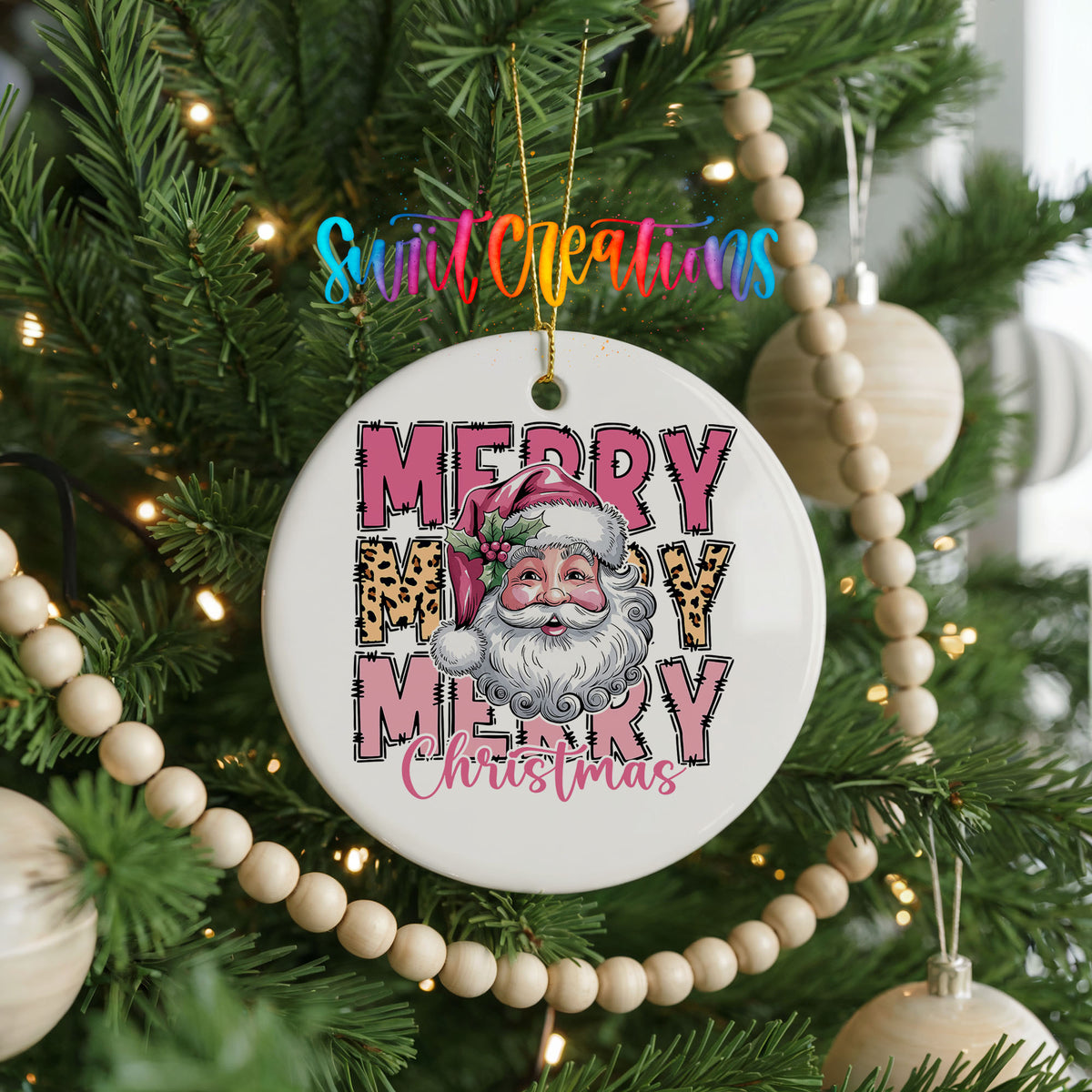 Round ceramic Christmas ornament featuring stacked Merry Merry Merry Christmas lettering with Santa and leopard print accents, hanging on a decorated Christmas tree