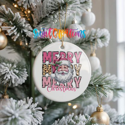 Round ceramic Christmas ornament featuring stacked Merry Merry Merry Christmas lettering with Santa and leopard print accents, hanging on a frosted Christmas tree