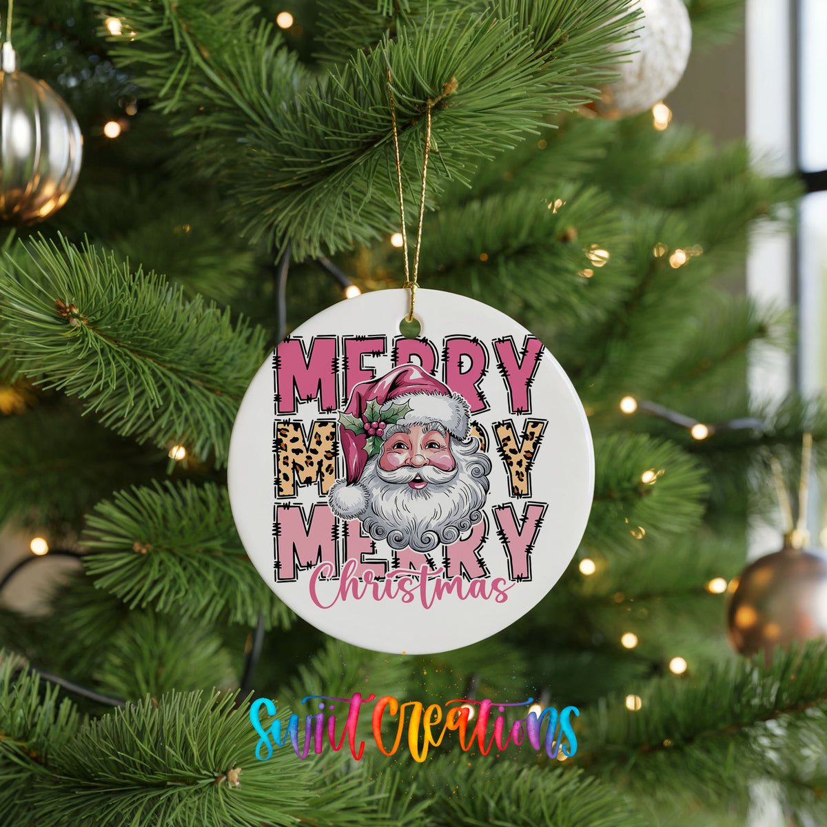 Round ceramic Christmas ornament featuring stacked Merry Merry Merry Christmas lettering with Santa and leopard print accents, hanging on a green Christmas tree